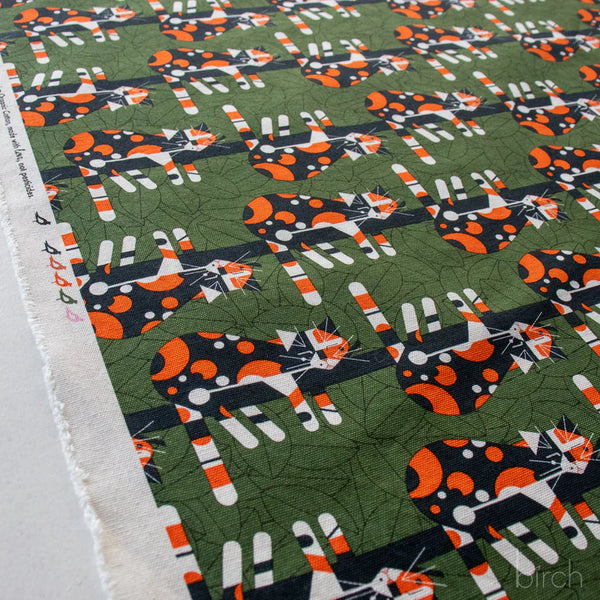 Selvage of Limp on a Limb dark green canvas fabric by Charley Harper for Birch Fabrics