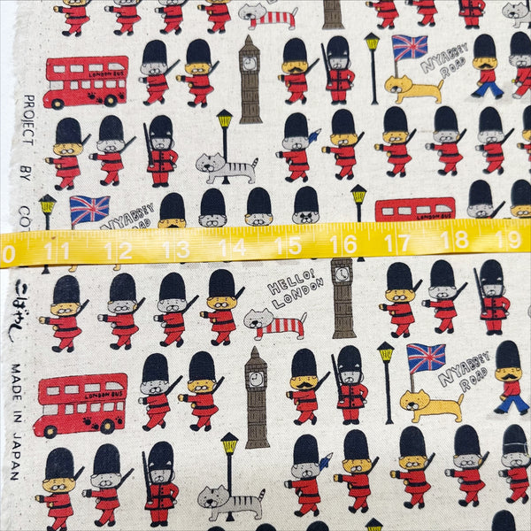 Scale of London Cats canvas fabric in natural cotton linen blend by Cotton Kobayashi featuring cats as royal guards