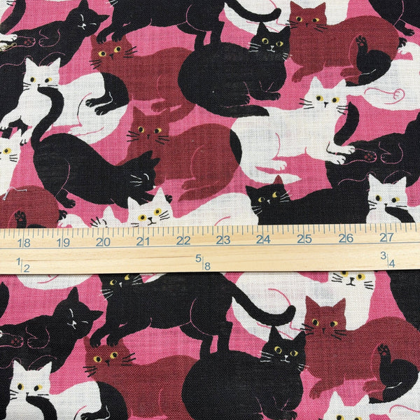 Scale of Lounge Cats textured cotton fabric by Sevenberry in pink, white, and black