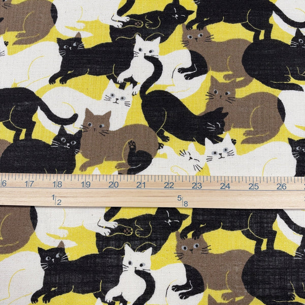 Scale of Lounge Cats textured cotton fabric by Sevenberry in yellow, white, and black