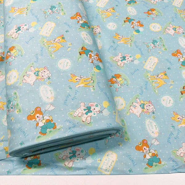 Bolt of Lovely Animal cotton fabric by Yuwa in pale blue and aqua, AT826599 D