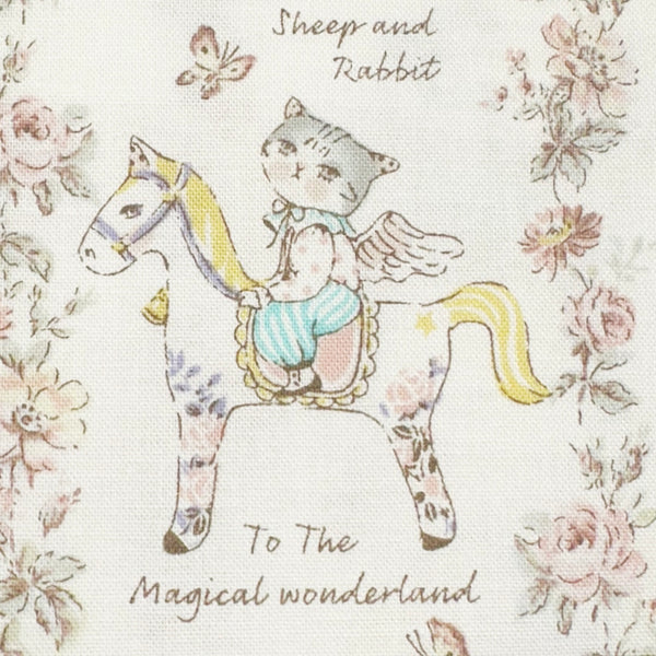 Close up of Magical Wonderland Cotton fabric by Yuwa Fabrics, in white