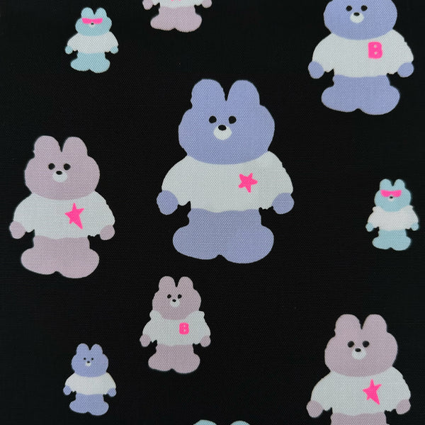 Close up of Mellow Friends Kuma Cotton Oxford Fabric in Black and Neon Pink featuring cute bears in shirts and hoodies with neon accents, imported from Japan.