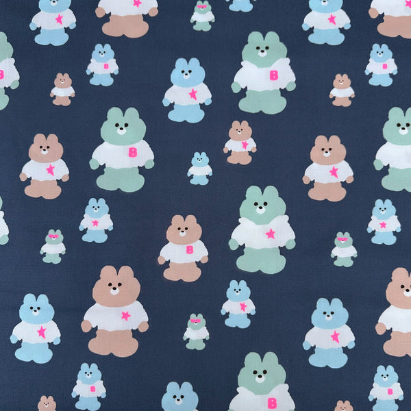 Mellow Friends Kuma Cotton Oxford Fabric in Blue featuring cute bears in shirts and hoodies with neon accents, imported from Japan.