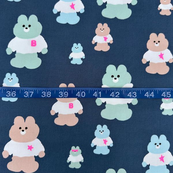 Scale of Mellow Friends Kuma Cotton Oxford Fabric in Blue featuring cute bears in shirts and hoodies with neon accents, imported from Japan.