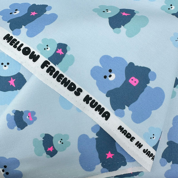 Selvage of Mellow Friends Kuma Cotton Oxford Fabric in Light Blue featuring cute bears in shirts and hoodies with neon accents, imported from Japan.