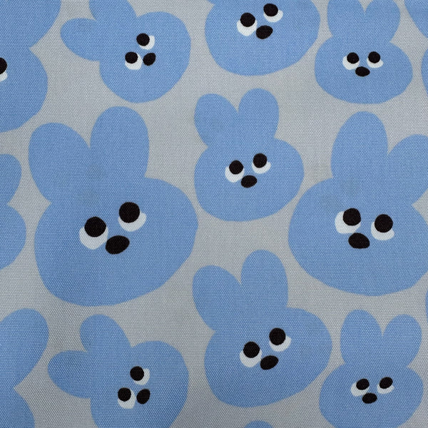 Scale of Mellow Friends Usagi Cotton Oxford Fabric in Blue featuring cute bunny faces in a playful print, imported from Japan.