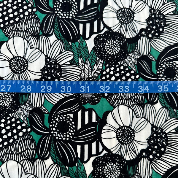 Scale of Modern Nordic Flower corduroy fabric by Cotton Kobayashi in green