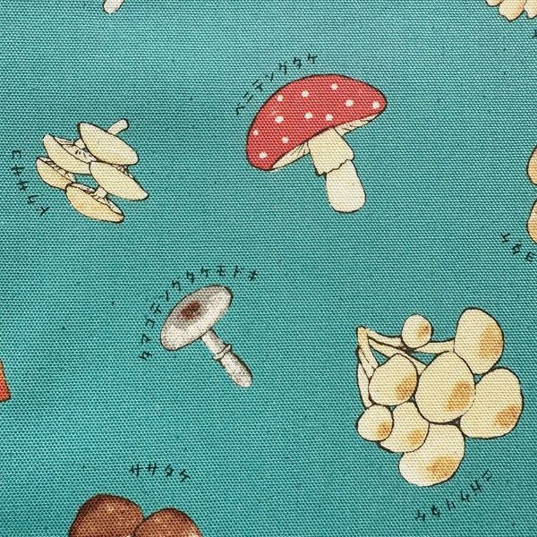 Close up of Mushroom cotton oxford fabric by Kokka in dusty teal, style YPA-71000 1C