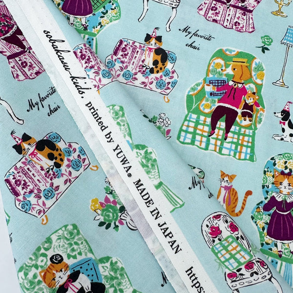 Selvage o My Favorite Chair Cotton fabric by Yuwa Fabrics, style SK829978, in aqua