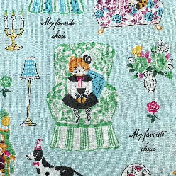 Close up of My Favorite Chair Cotton fabric by Yuwa Fabrics, style SK829978, in aqua