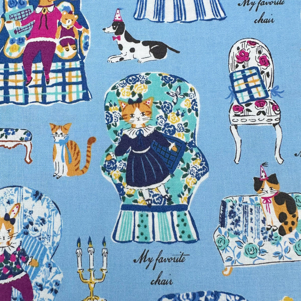 Close up of My Favorite Chair Cotton fabric by Yuwa Fabrics, style SK829978-B, in blue