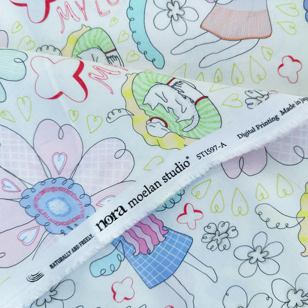 Selvage of My Love Utopia cotton fabric in natural by Nora featuring a whimsical illustration of girls, cats, and flowers