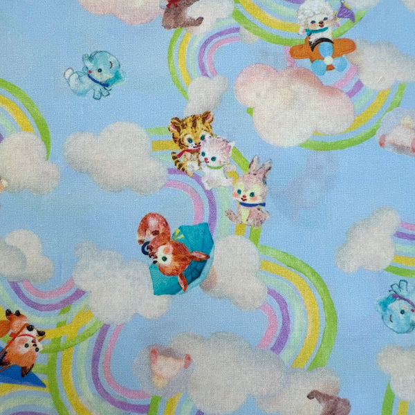 Cute animals in Nanairo Slider Cotton Lawn Fabric in Blue by Yukiemon for Hokkoh featuring whimsical illustrated sliders and charming characters on soft Japanese cotton lawn.