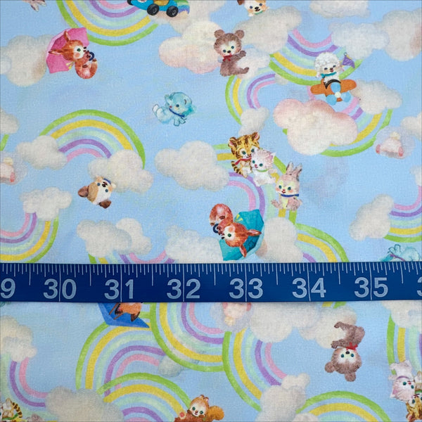 Scale of Nanairo Slider Cotton Lawn Fabric in Blue by Yukiemon for Hokkoh featuring whimsical illustrated sliders and charming characters on soft Japanese cotton lawn.