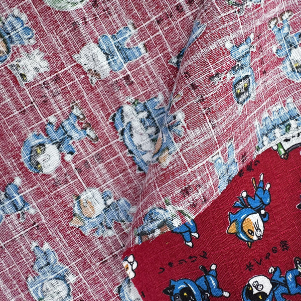 Weave of Neko Ninja cotton dobby fabric in crimson by Cosmo Textiles Imported from Japan