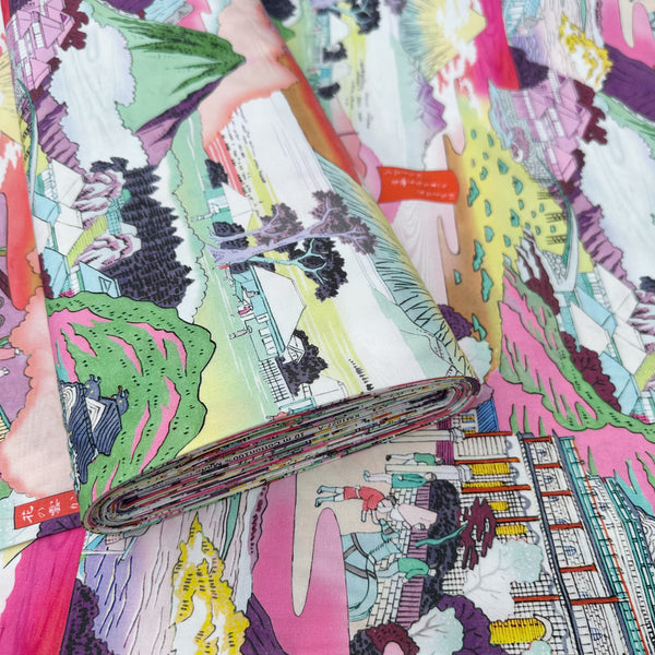 Bolt of Neo Japanesque cotton fabric in White Multi by Nora featuring a brightly colored Japanese landscape with mountains, villages, and traditional motifs