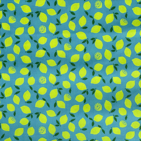 Neon Lemons cotton oxford fabric by Cosmo Textiles in blue, featuring neon yellow lemons