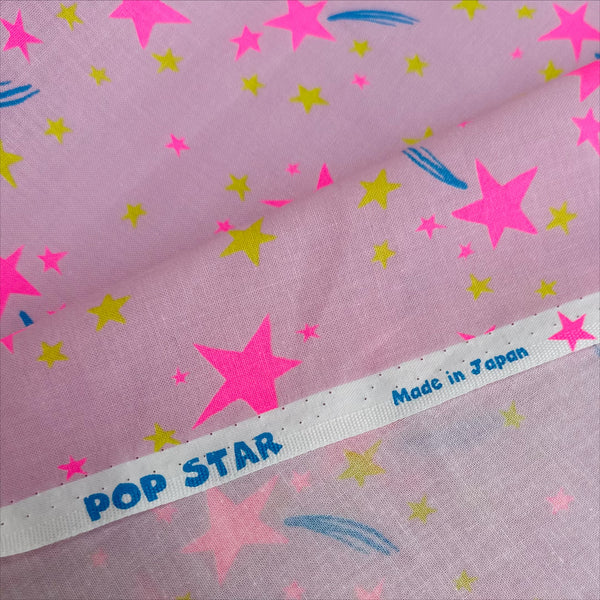 Selvage detail of Neon Pop Star Cotton fabric, Pink colorway, imported from Japan