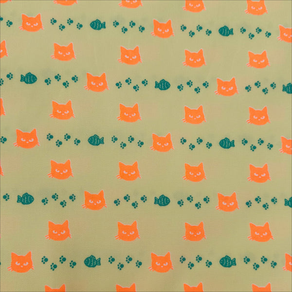 Neon Cat Cotton Oxford Fabric in Yellow featuring a playful print of fish, paws, and neon cat faces, imported from Japan.
