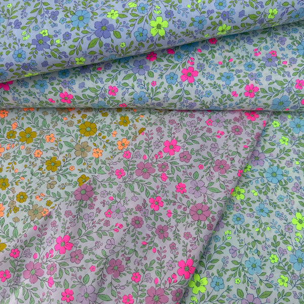 Colors of Neon Flower Cotton Broadcloth Fabric featuring a vibrant floral print with neon accents, imported from Japan.