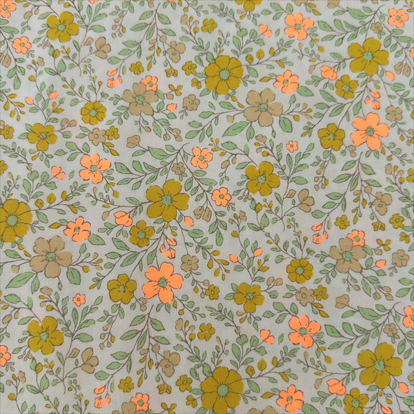 Neon Flower Cotton Broadcloth Fabric in Orange featuring a vibrant floral print with neon accents, imported from Japan.