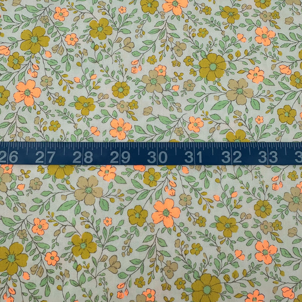Scale of Neon Flower Cotton Broadcloth Fabric in Orange featuring a vibrant floral print with neon accents, imported from Japan.