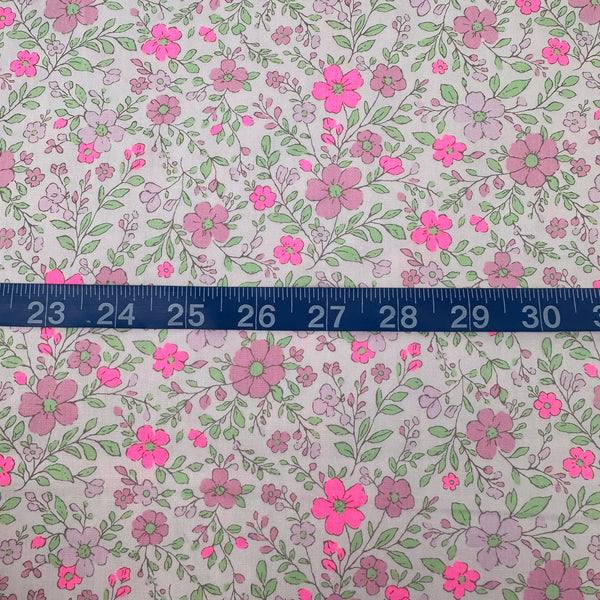 Scale of Neon Flower Cotton Broadcloth Fabric in Pink featuring a vibrant floral print with neon accents, imported from Japan.
