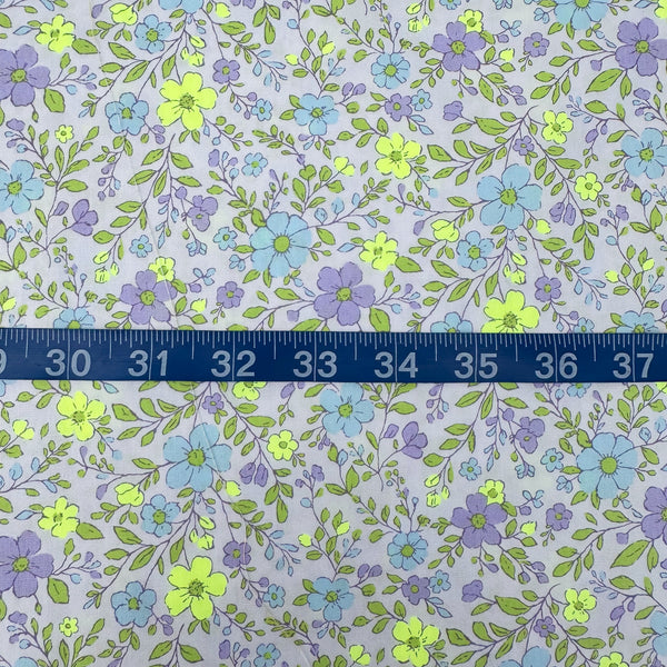 Scale of Neon Flower Cotton Broadcloth Fabric in Purple featuring a vibrant floral print with neon accents, imported from Japan.