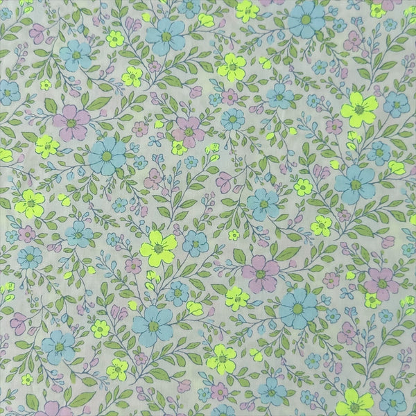 Neon Flower Cotton Broadcloth Fabric in Yellow featuring a vibrant floral print with neon accents, imported from Japan.