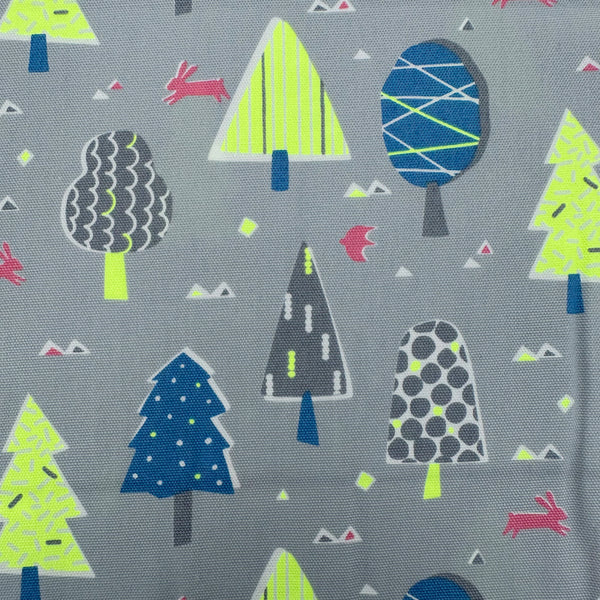Close up of Selvage of Neon Forest Cotton Oxford Fabric in Gray featuring a forest-inspired print with neon colors, imported from Japan.