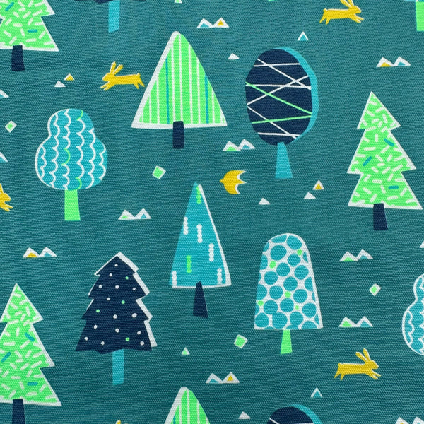 Close up of Neon Forest Cotton Oxford Fabric in Neon Green featuring a vibrant forest-inspired print with neon colors, imported from Japan.