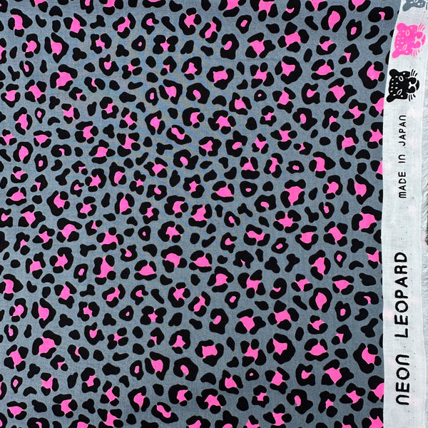 Selvage of Neon Leopard Cotton Fabric in Gray and Neon Pink featuring a bold leopard print with neon accents, imported from Japan.