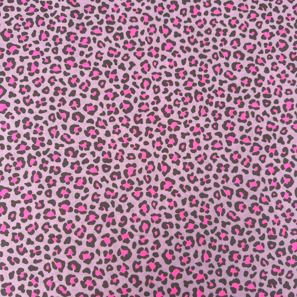 Neon Leopard Cotton Fabric in Pink featuring a bold leopard print with neon accents, imported from Japan.