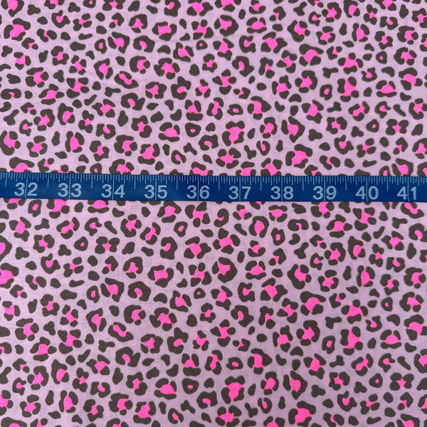 Scale of Neon Leopard Cotton Fabric in Pink featuring a bold leopard print with neon accents, imported from Japan.