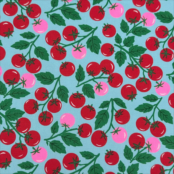 Neon Tomato Cotton Oxford Fabric in Blue featuring a playful tomato print with neon accents, imported from Japan.