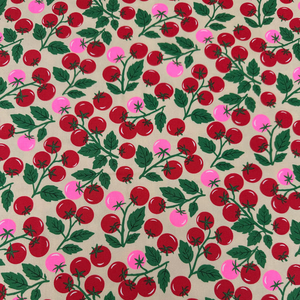 Neon Tomato Cotton Oxford Fabric in Cream featuring a playful tomato print with neon accents, imported from Japan.