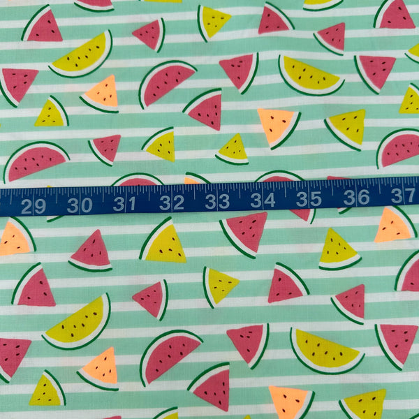 Scale of Neon Watermelon Cotton Fabric in Mint featuring a bright watermelon print with neon accents, imported from Japan.