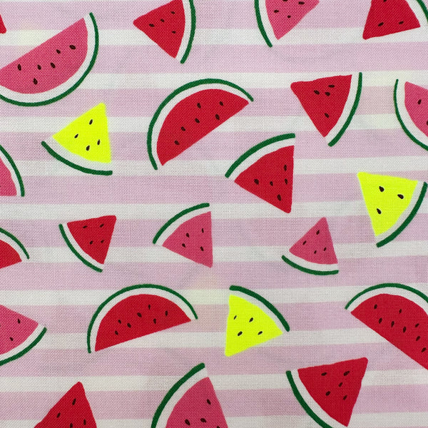 Close up of Neon Watermelon Cotton Fabric in Pink featuring a bright watermelon print with neon accents, imported from Japan.