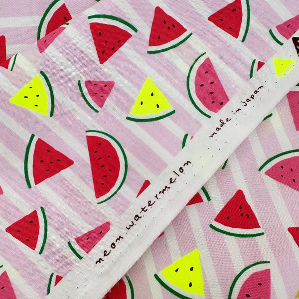 Selvage of Neon Watermelon Cotton Fabric in Pink featuring a bright watermelon print with neon accents, imported from Japan.