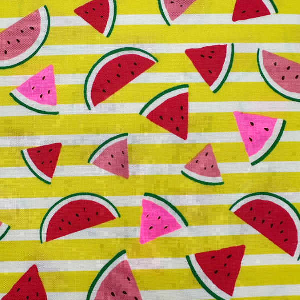 Close up of Neon Watermelon Cotton Fabric in Yellow featuring a bright watermelon print with neon accents, imported from Japan.