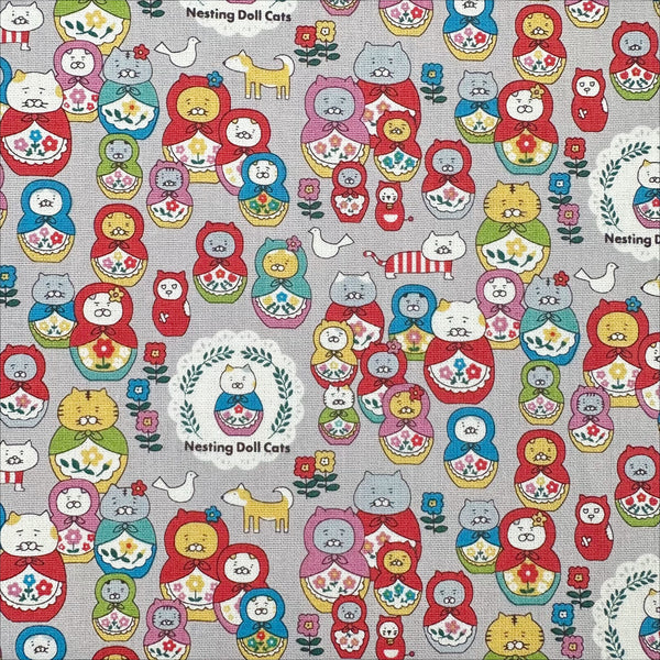 Nesting Dolls Cats Cotton Canvas Fabric by Cotton Kobayashi, style KTS-7177D, featuring cat nesting doll illustrations, in gray, imported from Japan