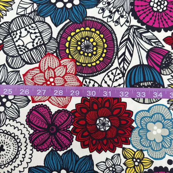 Scale of Nordic Flower cotton oxford fabric by Cosmo Textiles featuring a graphic floral print on a natural background.