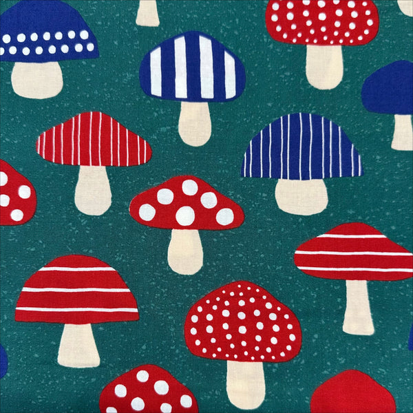 Nordic Mushroom cotton fabric in teal by Cosmo Textiles featuring Scandinavian-inspired mushroom illustrations imported from Japan