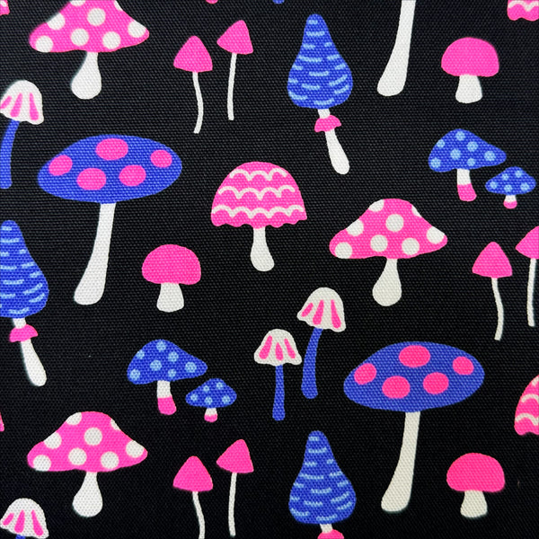 Close up of Omushi Mushrooms Oxford cotton fabric in black and neon pink, Japanese Import, medium weight cotton for sewing and quilting