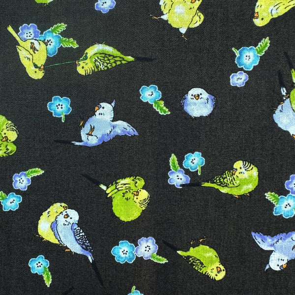 Close up of Parakeet and Flower Cotton Fabric by Cosmo Textiles, style AP61903H 1F, featuring parakeets and flowers, in deep charcoal
