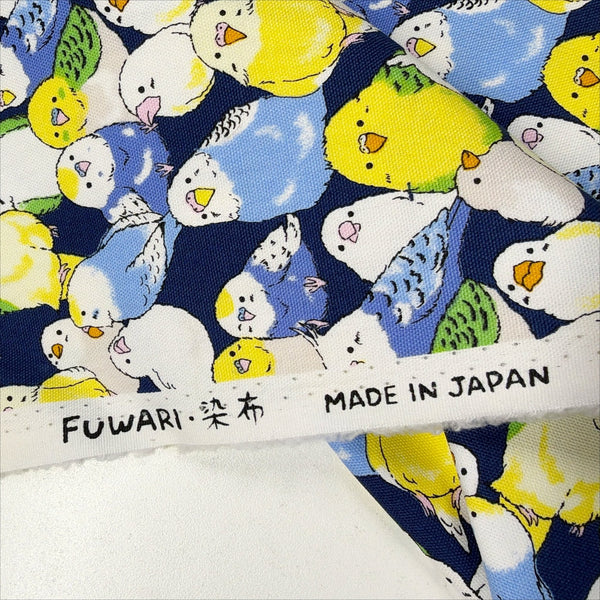 Selvage of Parakeets cotton oxford fabric by Fuwari in navy