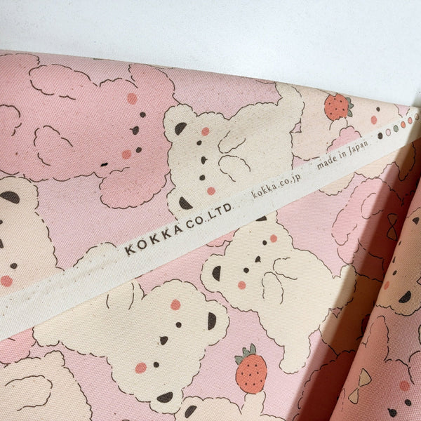 Selvage of Pastel Bonbon Bears cotton oxford fabric by Kokka in pink, YKA-39030 1A