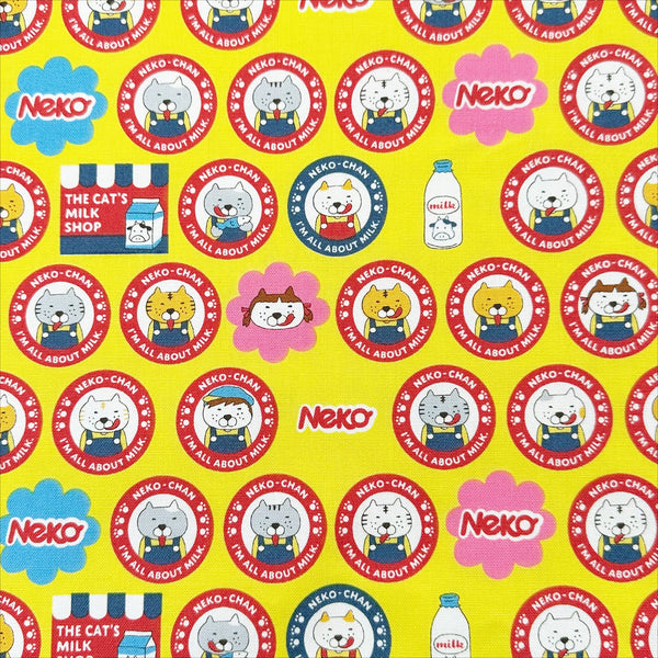 Pero Neko Cats cotton canvas fabric in yellow by Cotton Kobayashi featuring playful illustrated cats, imported from Japan