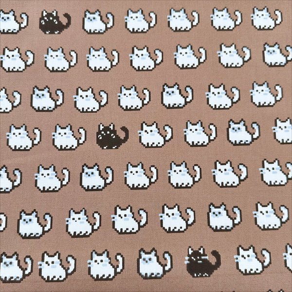 Pixel Cats cotton oxford fabric in mocha with playful pixel-style cat print, imported from Japan